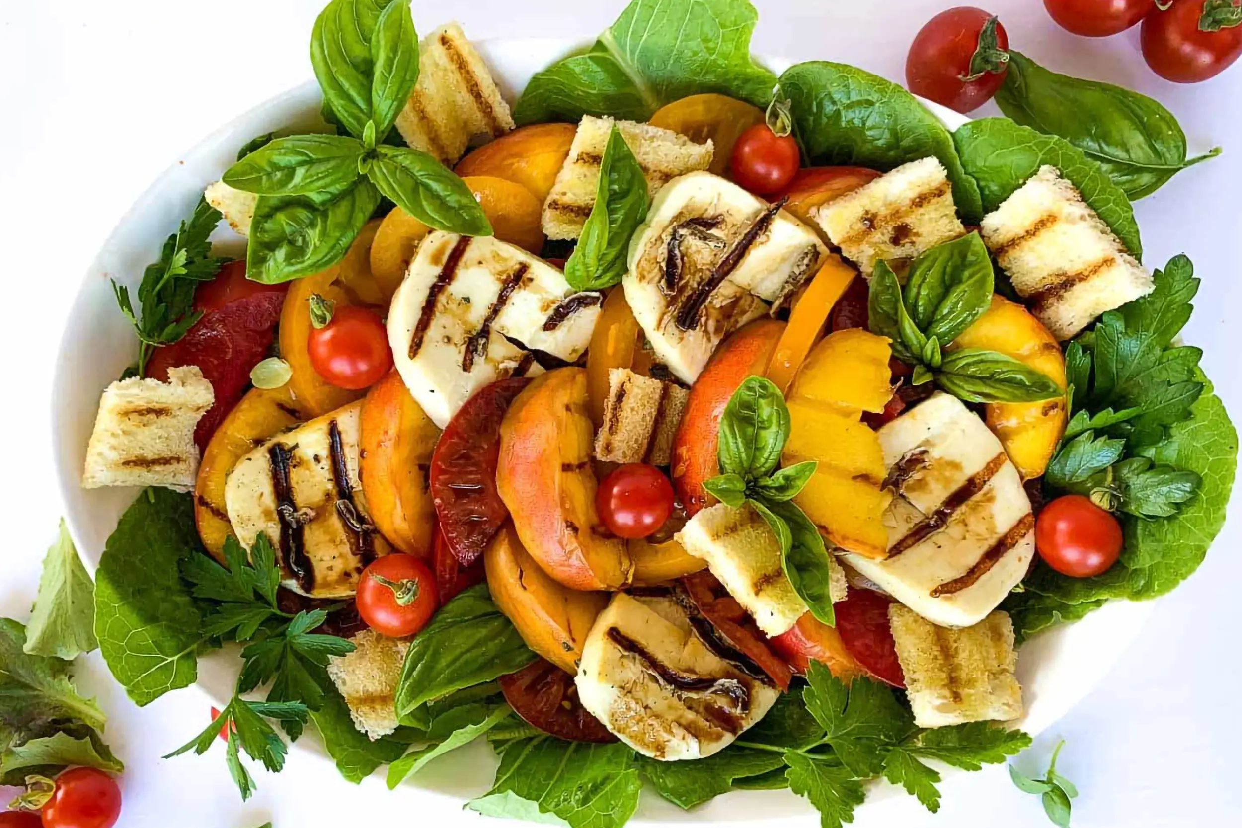 Tomato Salad with Basil Vinaigrette and Halloumi
